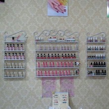 佳城铁艺专卖店 壁挂铁艺指甲油架美甲店展示架化妆品架子多层货架烟架收纳架 铁艺服装架图片