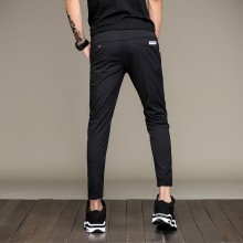 2017春夏新款韩版男式橡筋运动裤 青年纯色印花抽绳束脚休闲裤男