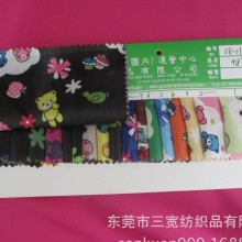 SK-0168#厂家热销童装新款300T油面压光卡通印花风衣