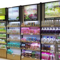 护肤品背柜美容院产品柜美妆店道具日化店装修设广州计化妆品展示柜化妆品展柜定制厂家